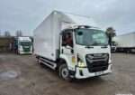 ISUZU F12 bva caisse fourgon + hayon + porte latérale 12T / charge utile 4850 Kg